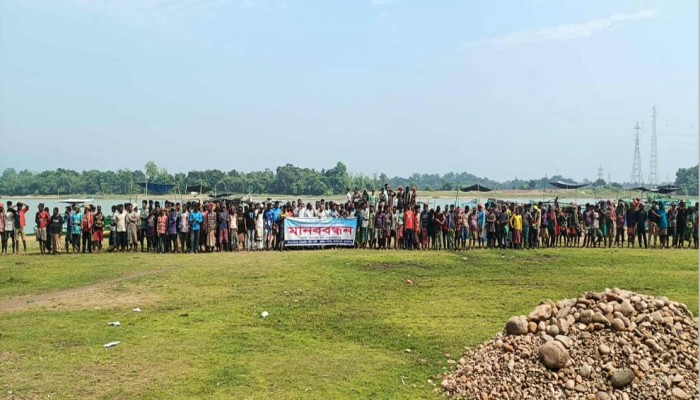 যাদুকাটা নদীতে শ্রমিক হয়রানির প্রতিবাদে মানববন্ধন যাদুকাটা নদীতে শ্রমিক হয়রানির প্রতিবাদে মানববন্ধন